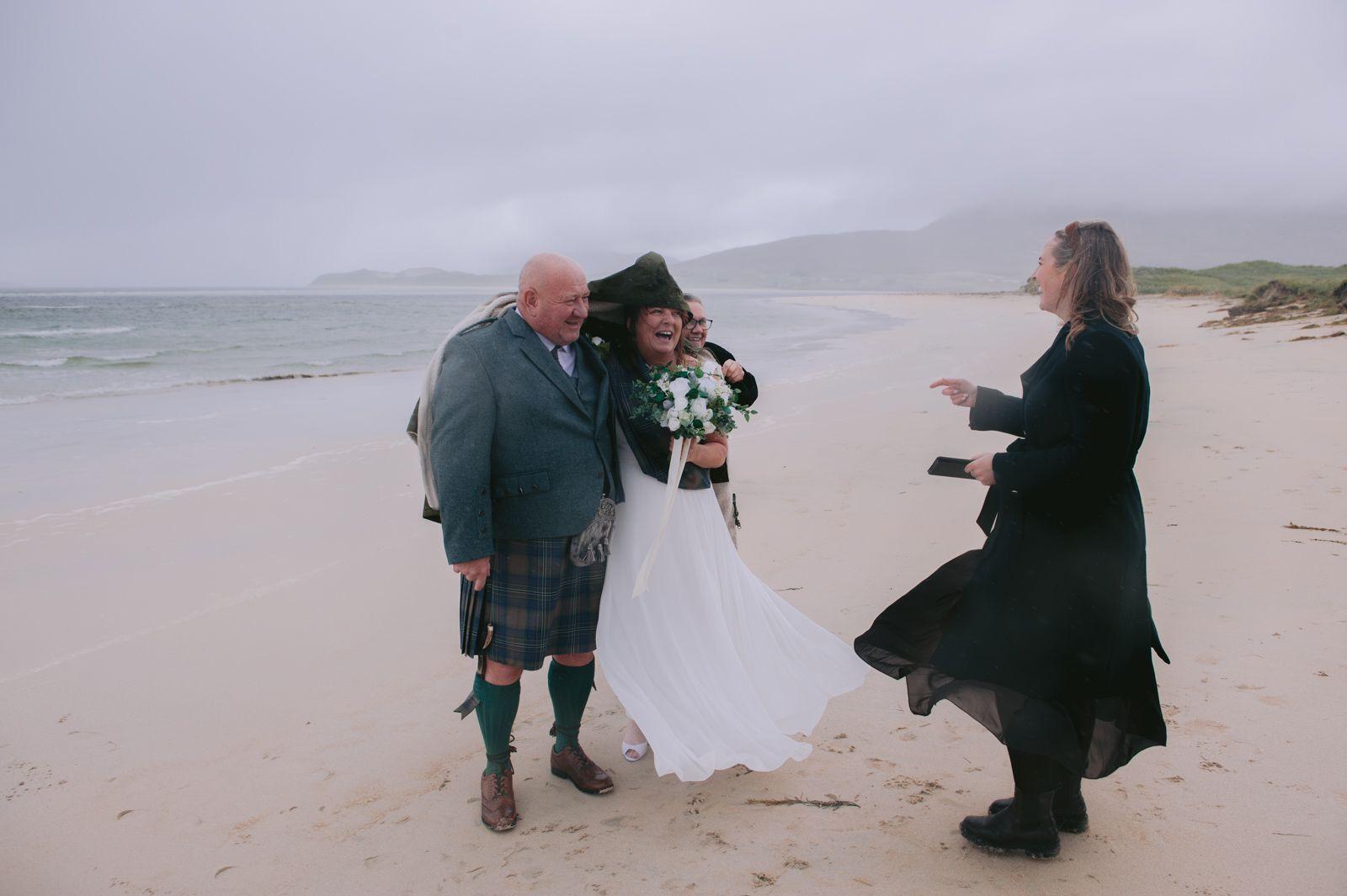 Humanist celebrant Rona welcoming the bride and groom at their wedding ceremony on Seilebost beach