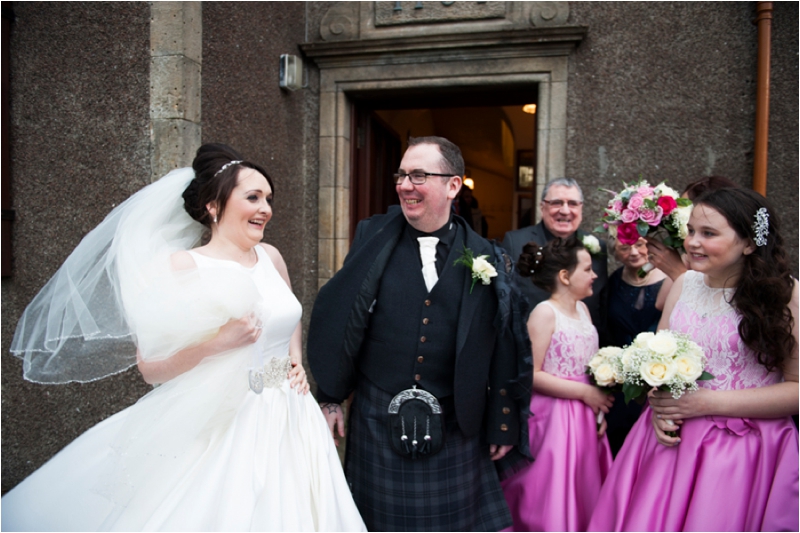 Outside St Martins Memorial Church wedding photographer 