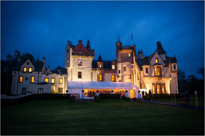 aldourie castle at night scottish highland wedding