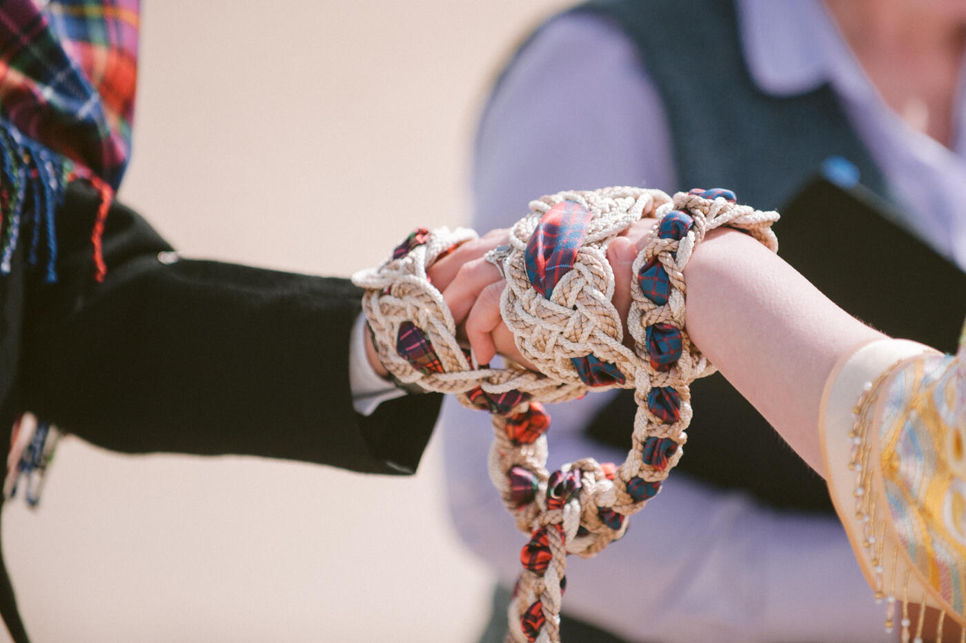 hand fasting at beach wedding 