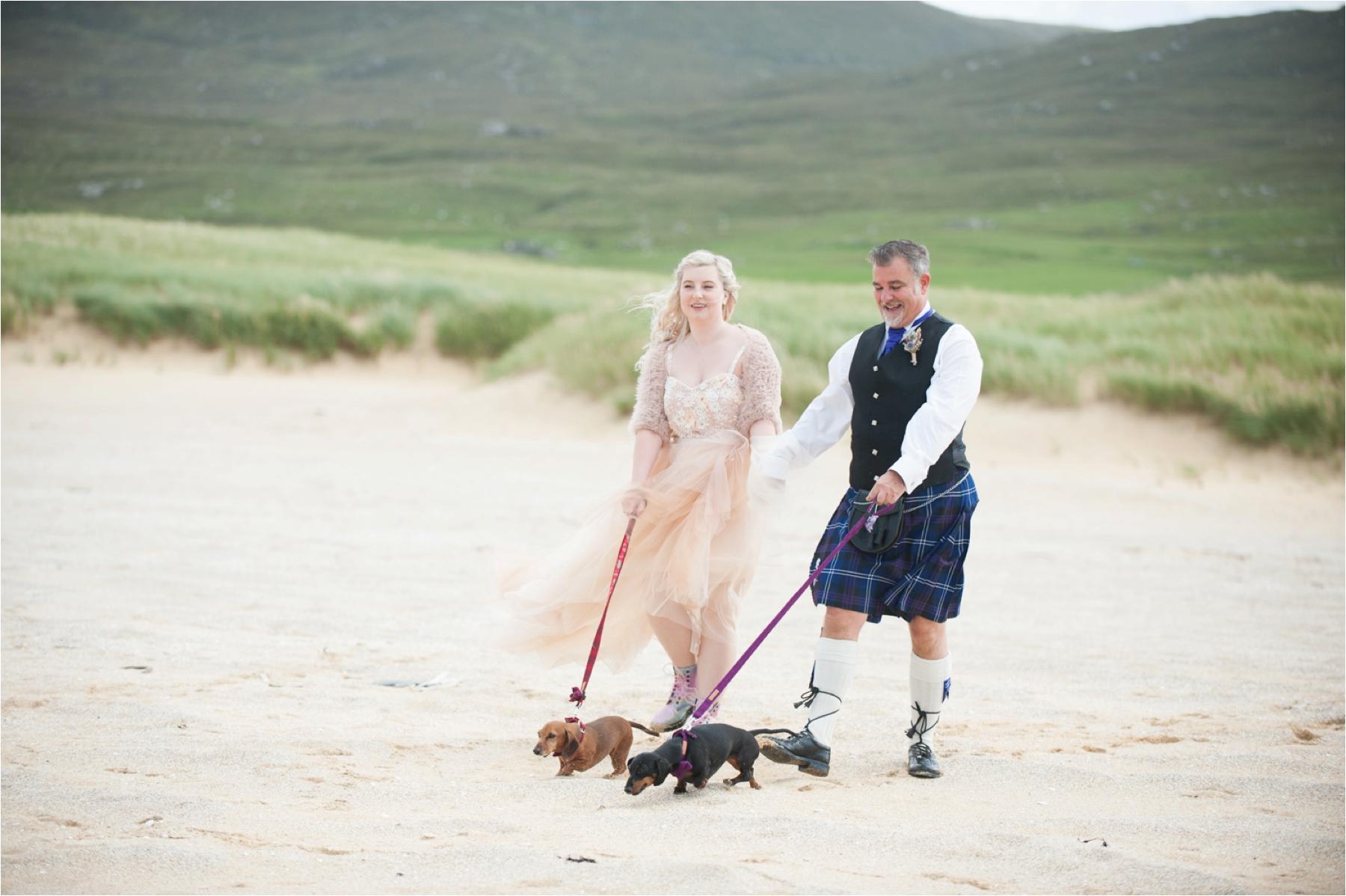 Scarista Beach wedding with a couple and their sausage dogs. 