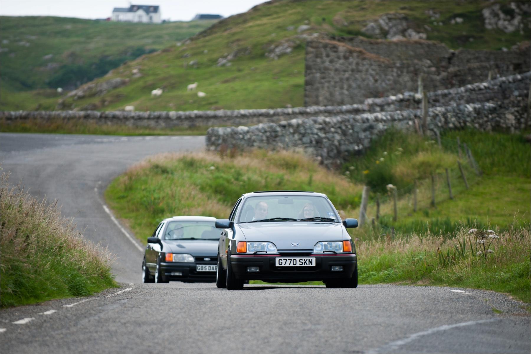 A set of four classic Fords were used to drive the groom and his groomsmen to his wedding at the Church of St Clements in Rodel on the Isle of Harris.