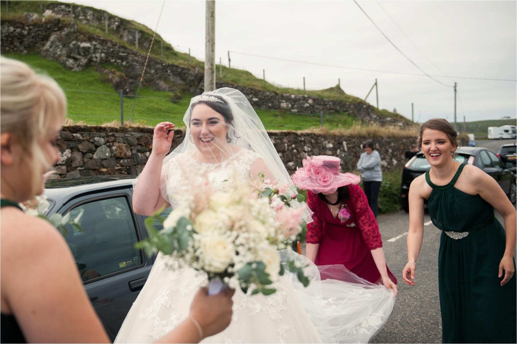 Bride Lauren arrives at St Clements Church in Rodel on the Isle of Harris, ready for her and Michael's wedding in front of their friends and family. 