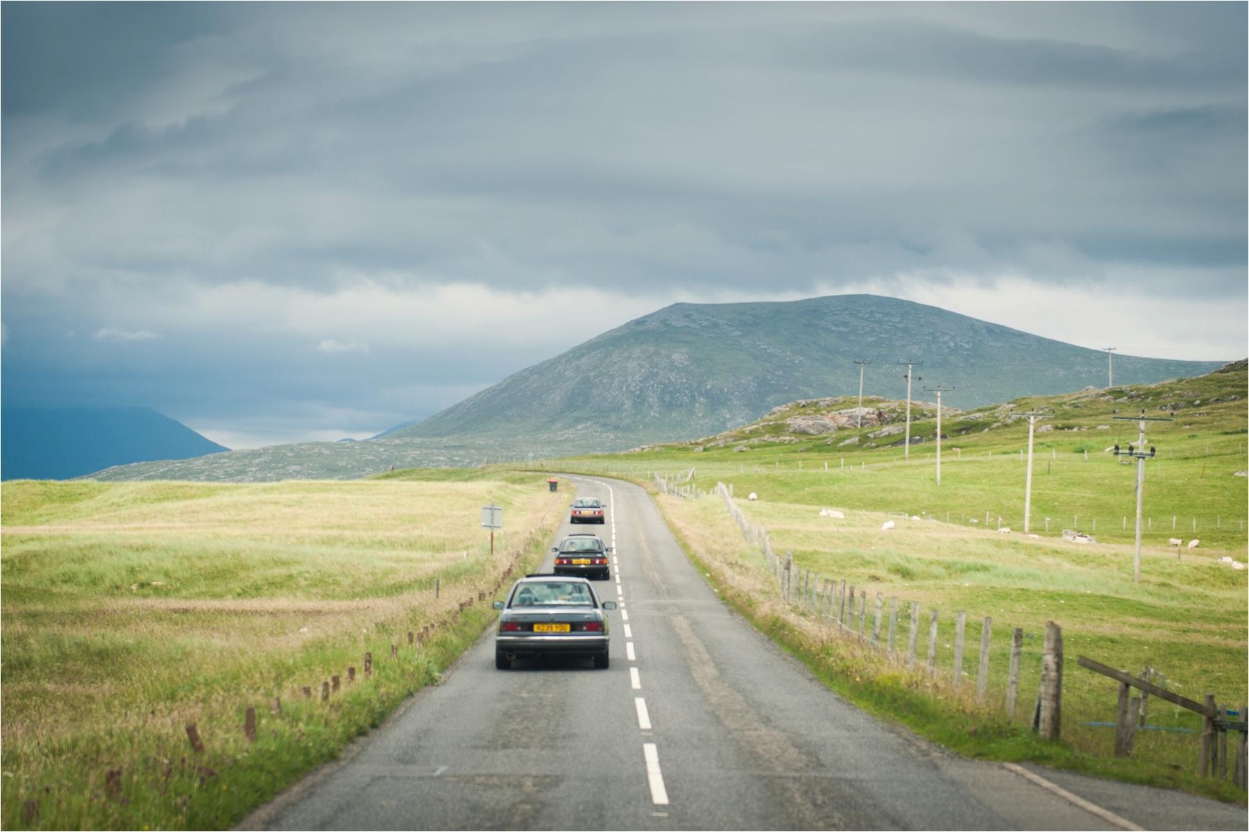 A set of classic Ford cars transported guests for Lauren and Michael's wedding on the Isle of Harris. 