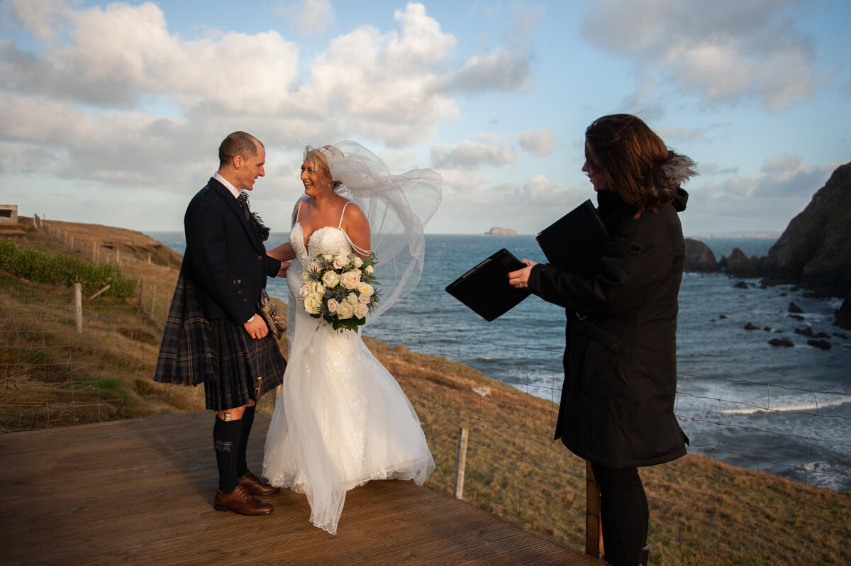 wedding on balcony overlooking cliffs on the isle of lewis 