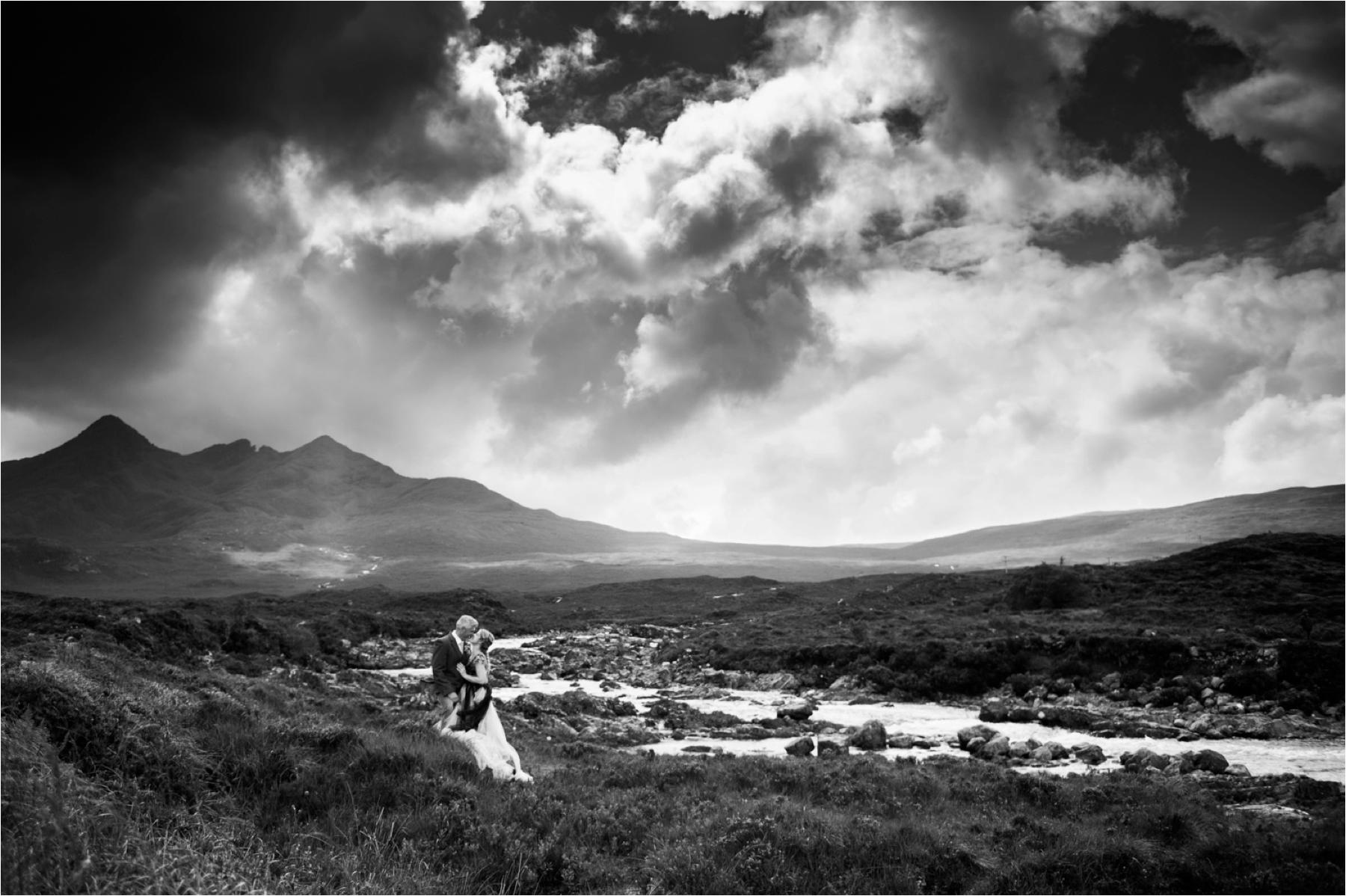 Dramatic couple shot on the Isle of Skye in black and white. Photographer: Margaret Soraya 