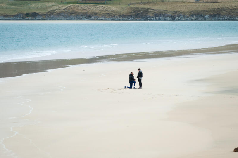 photograph of a wedding proposal on an isle of harris beach 