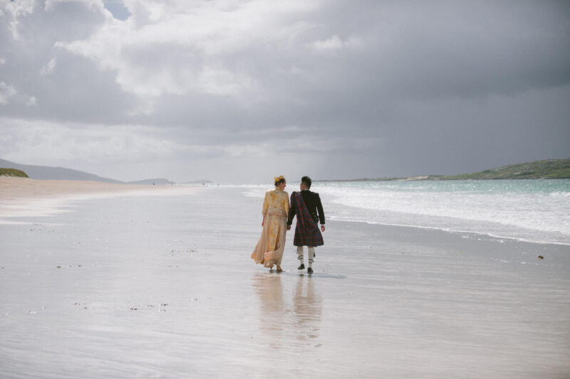 wedding couple walking on luskentyre beach