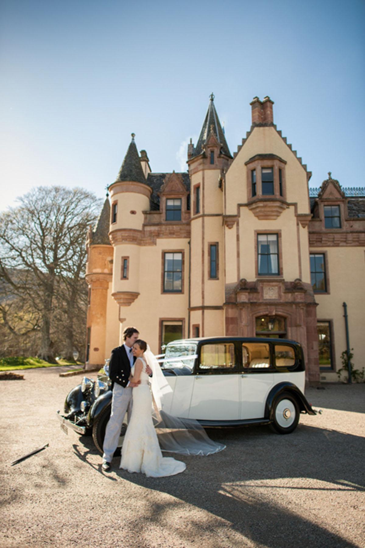 Wedding couple outside aldourie castle 