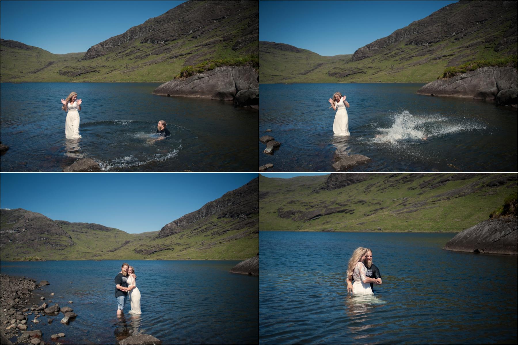 A couple jump into the water fully clothed during a Loch Coruisk portrait shoot. 