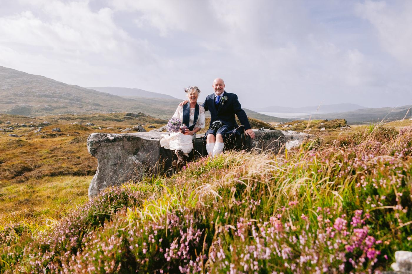Marge and David sitting among the heather above Luskentyre