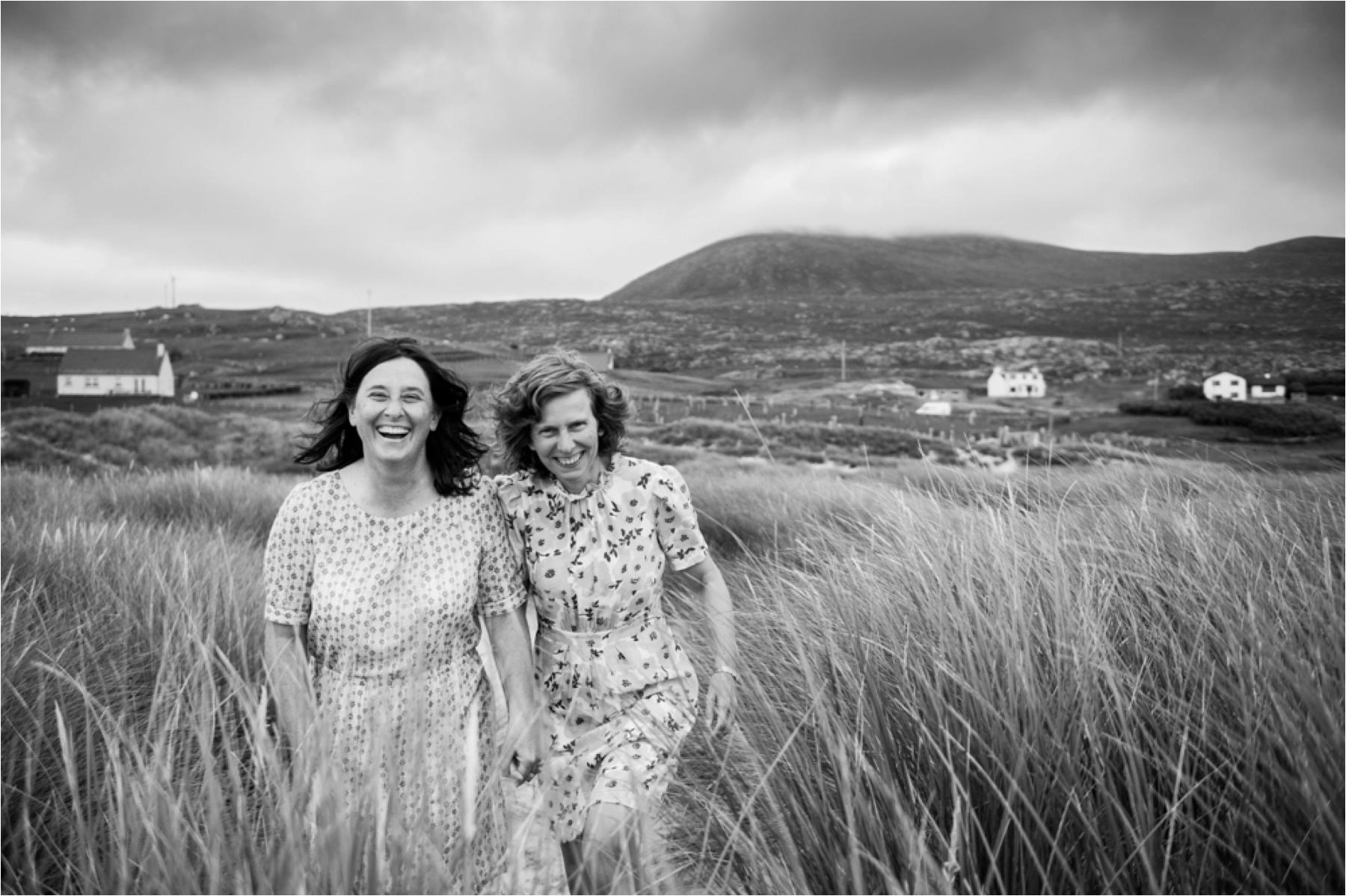 Two brides on Luskentyre Beach for their elopement on the Isle of Harris in the Scottish Highlands. 