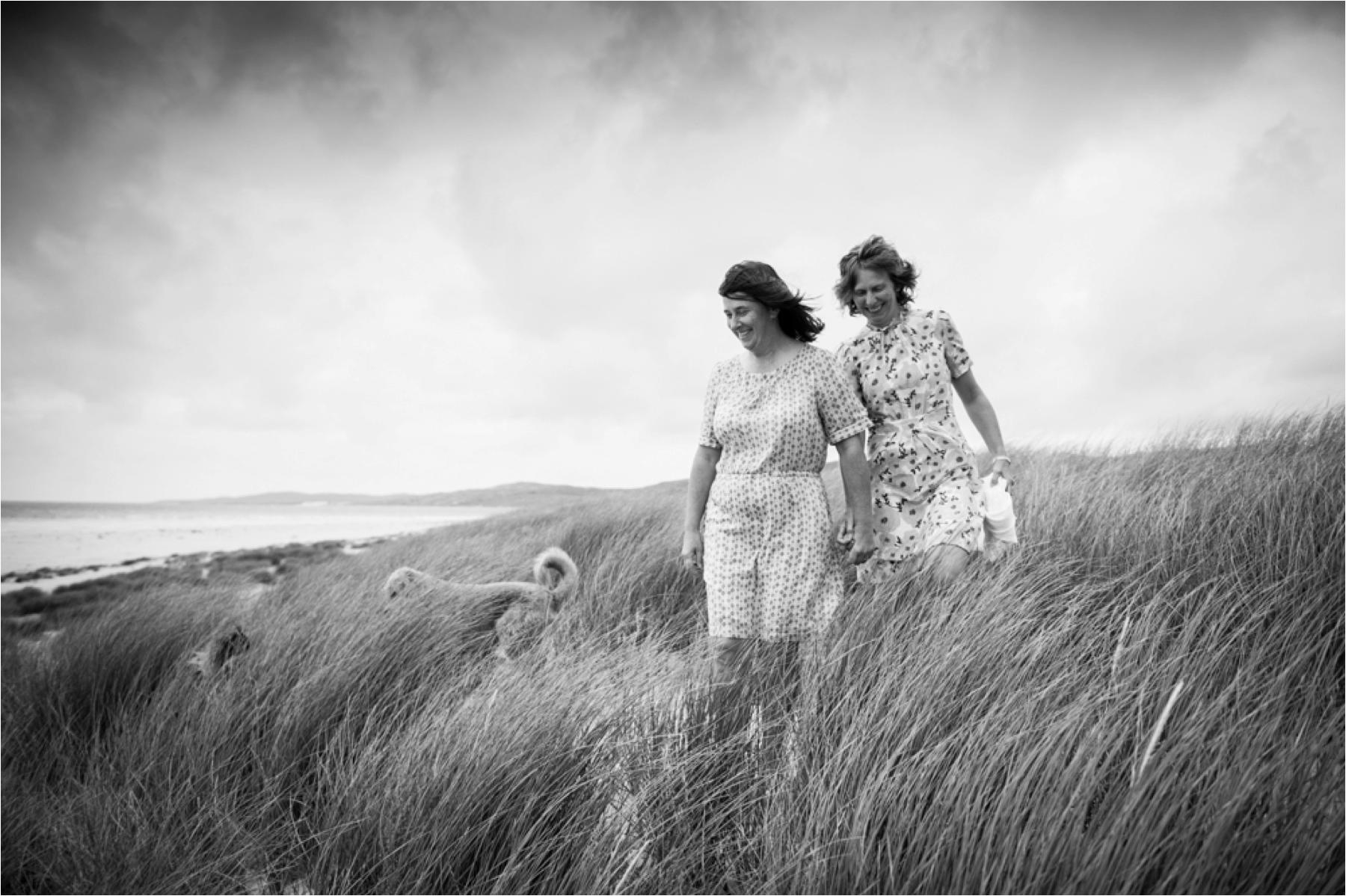 Two brides and two dogs on Luskentyre Beach. The Outer Hebrides elopement was on a deserted beach with just two witnesses. 