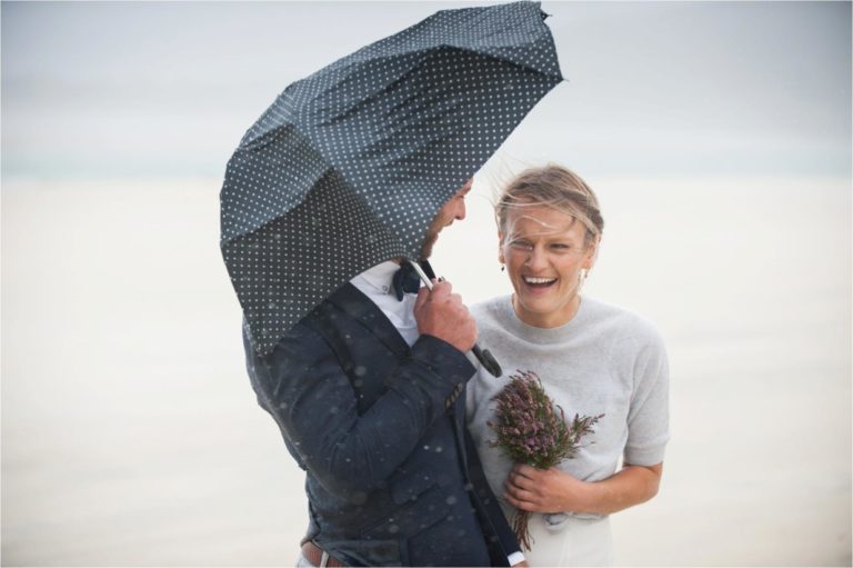 couple getting married in the rain on the hebrides, scotland