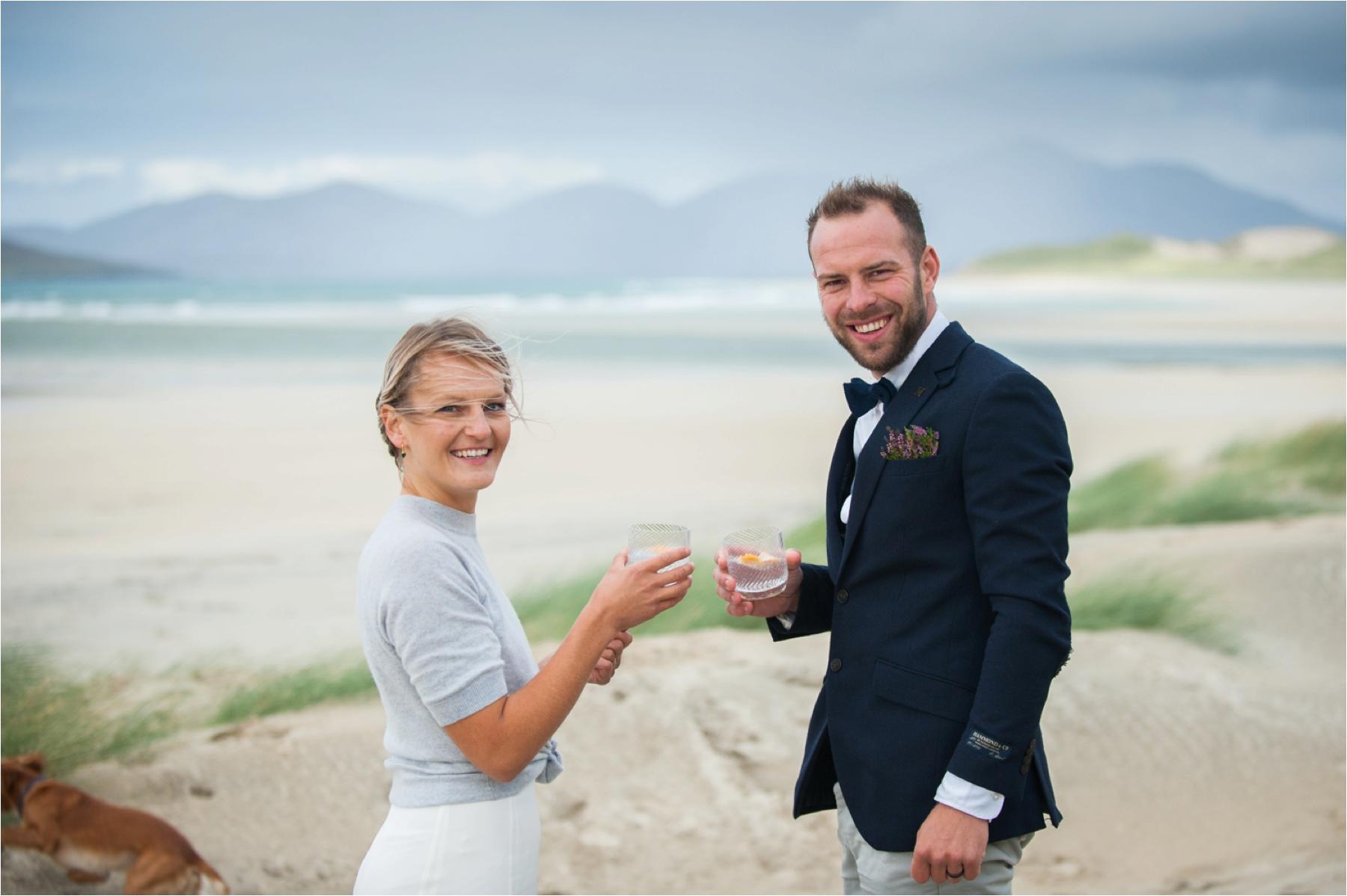 Newlyweds toast their marriage on the Isle of Harris with Harris Gin. 